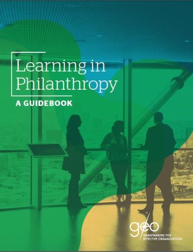 This publication cover of "Learning in Philanthropy: A Guidebook" features a full-page image of three individuals in conversation. The image has an overlay of teal